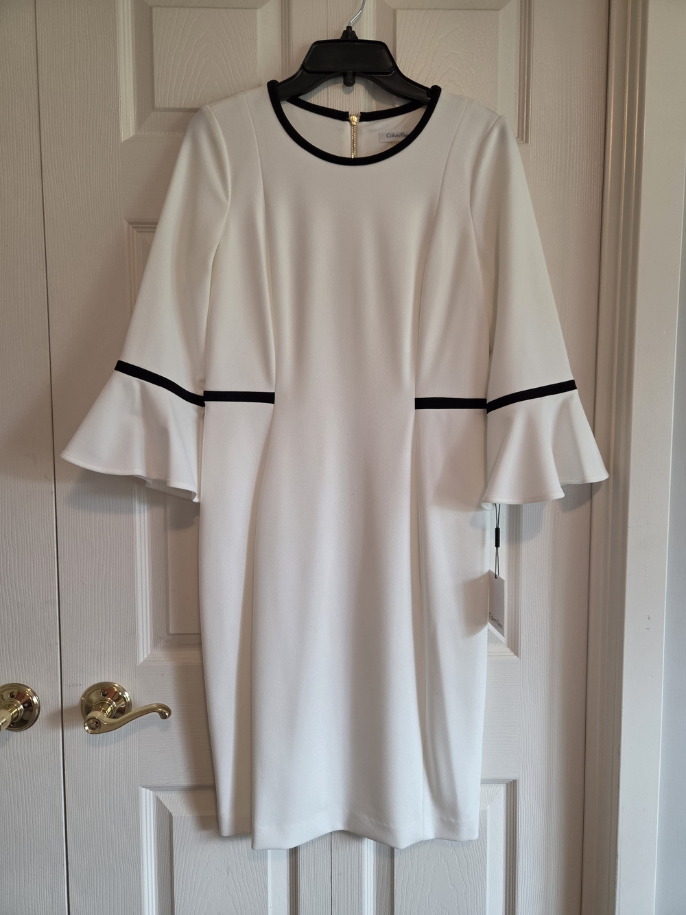 Cakvin Klein Elegant White Bell-Sleeve Dress with Black Trim